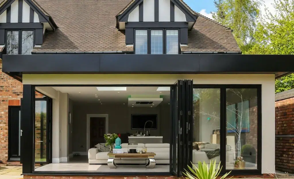 WeatherMaster bi-fold doors opening onto an outdoor living space.