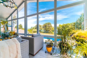Insulated sunroom providing fall comfort at a Saint John home.